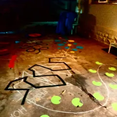 Here you can see the "Frog Hop" lily pads taking shape. I use bright, contrasting colors and clear instructions painted directly onto the floor to guide users through this large-scale interactive game.