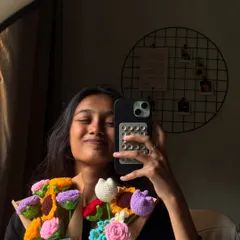 This is me in my natural habitat, surrounded by yarn and chaos. I whipped up these colorful crochet flower bouquets in just 24 hours for a rush order. Each bouquet is unique, featuring a mix of flowers like sunflowers, tulips, and roses that will never wilt. 💐