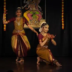 A moment of storytelling from a duet performance. Choreographing and performing pieces that explore the relationship between divine figures like Shiva and Shakti or Radha and Krishna allows for deep emotional expression and connection.
