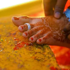 A close-up of the toe ring ritual, a significant moment in many Indian weddings. I focus on capturing these small but meaningful details.