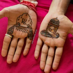The same groom's mehendi, shown against a different background. The designs are clean, sharp, and perfect for a modern groom.