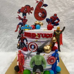 For the ultimate superhero fan, we assembled this action-packed Avengers cake. It features figures of the Hulk, Captain America, Iron Man, and Spider-Man, ready to make any birthday celebration epic.