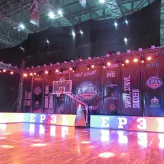 A view of the court setup for the EP3L half-court tournament. The stadium is fully equipped with banners, digital scoreboards, and professional lighting rigs for high-stakes events.