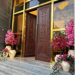 I transformed this grand entrance in Vrindavan with vibrant, high-quality faux bougainvillea and cherry blossoms. This setup creates a stunning welcome for guests and is perfect for spaces where real plants might not survive.