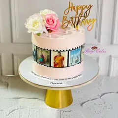 A reel of sweet memories for Mumma's birthday. This cake features an edible photo strip with cherished family pictures, combining modern personalization with a classic, elegant design.