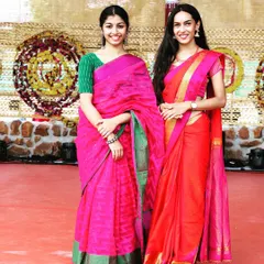 Posing with a guest at a traditional function. My ability to speak both English and Kannada helps me connect personally with all family members, making sure everyone feels part of the special day.