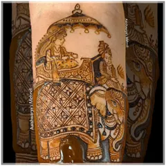 This design features a classic wedding scene of the bride and groom on an elephant. It's a majestic and traditional element that I love incorporating into full bridal designs for a royal feel.