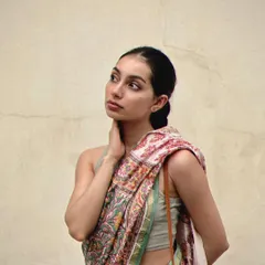 A casual and modern take on saree styling during a day out in Pondicherry. This shows how a traditional saree can be adapted for a contemporary, travel-friendly look.