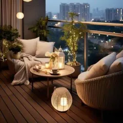 This cozy balcony setup shows how the right furniture and lighting can create a romantic city viewpoint. We used comfortable wicker chairs, warm string lights, and planters to make this a perfect spot for two.