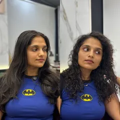 This is the modern perm. I took her straight hair and gave it these beautiful, natural-looking curls. It's all about adding texture and volume without the frizz of old-school perms.
