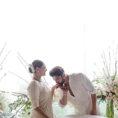 An intimate moment from Sonakshi and Zaheer's civil ceremony. The decor was minimal and elegant, with a backdrop of white branches and flowers creating a soft, romantic frame against the bright window.
