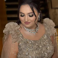 A close-up of the finished engagement look. The golden glitter on the eyes and the soft matte lip create a perfect balance of glamour and sophistication.