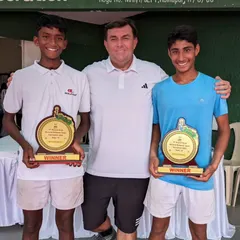 Tavish and his doubles partner Hruthik Katakam with their U16 Nationals winner's trophies. I am proud to have coached Tavish to this remarkable achievement.