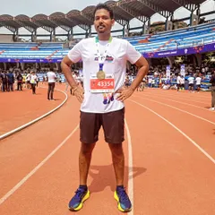 Standing tall after conquering 42.2 kilometers. This is a testament to the dedication and spirit of our runners. We celebrate every single finisher like the champion they are.