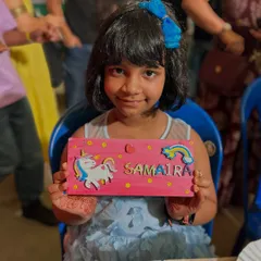 This young artist created a magical unicorn nameplate at our pop-up stall. So proud of her work.