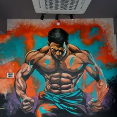 For businesses like gyms, the right visual can be a huge motivator. I painted this intense bodybuilder mural at Flexfire Premium Gym to create an atmosphere of power and determination. The vibrant colors and dynamic pose are designed to inspire everyone who walks in.