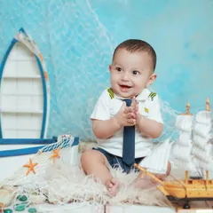 Ahoy, little sailor. Our new sailor theme comes with a cute uniform, a boat, and a nautical backdrop for an adorable seafaring adventure.