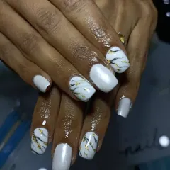 A full view of the white marble nail art. This is a timeless design that looks amazing for any special occasion or just to elevate your everyday style.