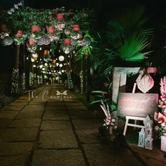Your guests' experience begins the moment they arrive. We crafted this magical, fairy-lit pathway with hanging disco balls and rustic baskets to guide guests into an evening of celebration.