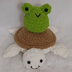 This was a fun custom order: a little froggy sitting on top of a turtle! I love bringing your quirky and creative amigurumi ideas to life.