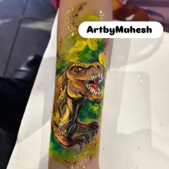 This isn't just for kids. I also create detailed and realistic body art, like this fierce T-Rex temporary tattoo, perfect for themed events or anyone wanting to make a bold statement.