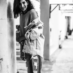 A candid, smiling portrait from that same early Bhaane shoot. Capturing these moments of uninhibited joy has been a core part of my work from the very beginning.