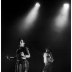 A black and white shot from 'Naga Mandala' that captures the stark, dramatic lighting we use. The interplay of light and shadow is central to this production's aesthetic.