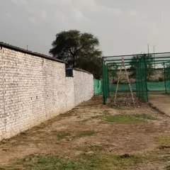 The entrance to our academy, with the practice nets visible right behind. Our entire facility is designed for easy access and focused training, keeping everything a player needs within steps.
