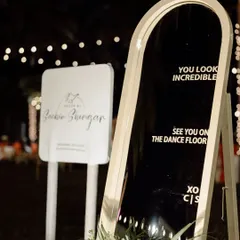 A fun and interactive decor piece for the reception. This mirror with the message "You look incredible, see you on the dance floor" not only looks chic but also gets guests excited for the party.