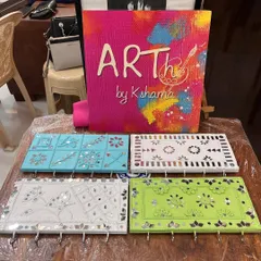 These are the custom Lippan art key holders I designed for a 60th birthday paint party. I created four different designs for the guests to choose from and personalize.