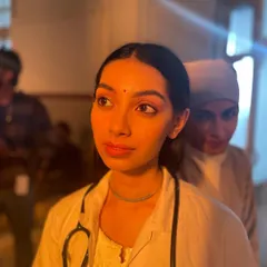 A still from the bilingual film 'Dange/Por' where I played Bhama, a character who transitions from a doctor to a dancer. This role challenged me to portray two very different worlds and mindsets within a single narrative.