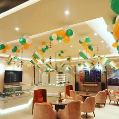 Another angle of the Independence Day office setup, showing how our ceiling decorations create a cohesive and celebratory atmosphere throughout the entire space, from the reception to the seating areas.
