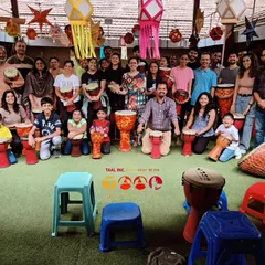 A full house at one of our community drum circles shows what we're all about: bringing people together. Here you can see families, kids, and adults of all ages sharing djembes and smiles. It’s a space for pure masti and connection.