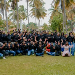 It's not just about weddings. I also capture the energy of corporate events, like this fun team outing in Bangalore. Getting a great group shot with everyone celebrating is always a highlight.