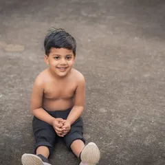 A simple, candid outdoor portrait of a young boy. Sometimes the most natural, unposed moments are the most precious.