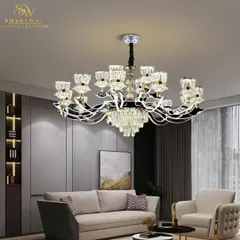 This is our Manila 264W Smart LED Chandelier, a beautiful blend of classic crystal design and modern technology. It's height adjustable and features three color modes. You can control it with a switch, a mobile app, or even your voice.