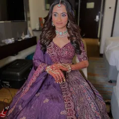 This lovely bride chose a deep purple embroidered lehenga from my rental collection for her celebration. Her happiness is my biggest reward.