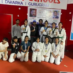 My students, the Shaolin stars, after a successful performance at the Delhi Martial Art Games, showcasing their medals and team spirit.
