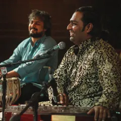 Sharing a smile on stage with ghazal singer Shri Sanam Khan during a performance at The Courtyard. The connection between the vocalist and accompanist is key to a successful mehfil.