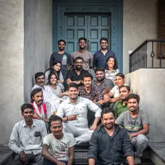 A project is never the work of just two people. This is our incredible team of designers, site supervisors, and craftsmen who helped bring the 'Prangan' project to life. Their dedication and skill are the backbone of everything we do.