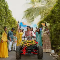 Making a grand entrance is a must. This couple arrived at their Haldi ceremony on a decorated ATV, surrounded by friends with color smoke guns, kicking off the event with energy and style.