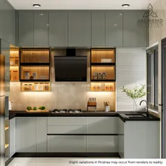 This U-shaped modular kitchen showcases a balanced design with sage green cabinets, open-lit shelving for spices, and a sleek black chimney, creating a modern and efficient cooking area.