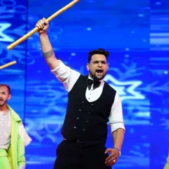 A powerful moment from a groom's solo performance. We love incorporating props like these dandiya sticks to add a dynamic and traditional element to a high-energy dance number.