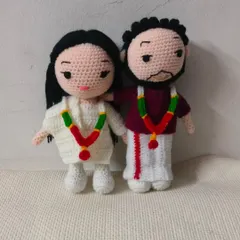 A beautiful custom doll couple dressed in traditional South Indian wedding attire. I carefully crocheted the veshti for him and the garland for both, making it a special memento of their big day.