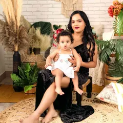 A mother and daughter moment in my favorite boho corner. The rich textures of the rug, pampas grass, and macrame create a warm and inviting atmosphere for this beautiful portrait.