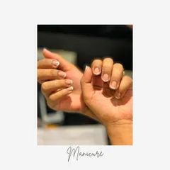 This image captures the clean and fresh feeling of a new French manicure, a timeless choice for healthy and well-groomed hands.