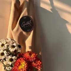 My Gobble Cake apron and some fresh flowers, the simple things that make for a perfect day of baking.