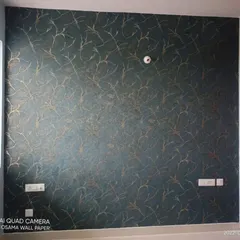 A dark teal wallpaper with a subtle, scratch-like texture in gold. This design adds depth and a touch of understated luxury, perfect for a bedroom or living room accent wall.