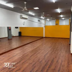 Another angle of our studio, showing the full-length mirrors that are essential for dancers to check their form and technique.