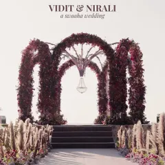 This wasn't just a mandap; it was a statement. For this beach wedding, I designed a dramatic, multi-arched structure covered in deep burgundy florals, creating a powerful, moody, and unforgettable altar against the bright sky. It's about bold vision and architectural floral design.